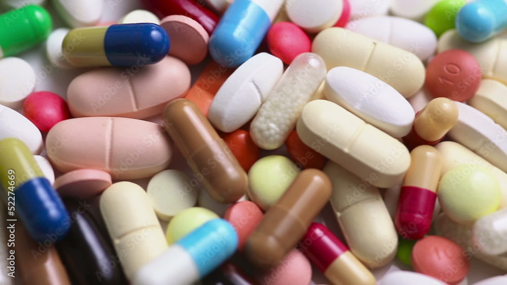 Medical pills turning in a loop Medical pills turning in a loop
