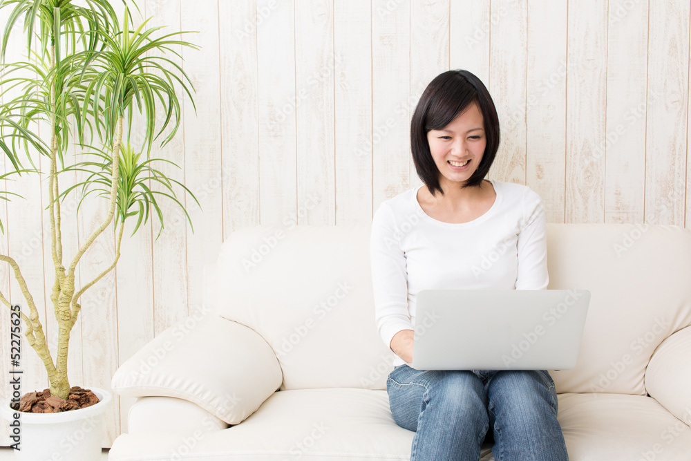 beautiful asian woman using laptop computer beautiful asian woman using laptop computer