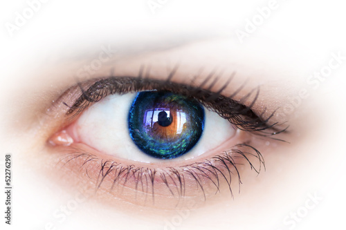 Human eye with galaxy inside.