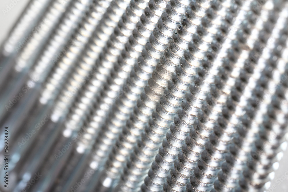 Close-up of various steel nuts and bolts Close-up of various steel nuts and bolts