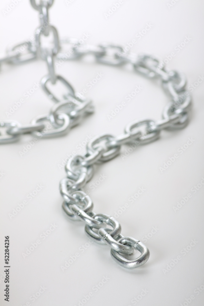 metal links of chain on a white background metal links of chain on a white background