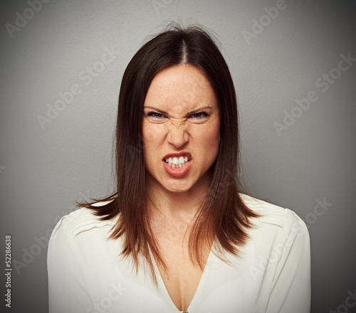 фотографія mad woman baring her teeth