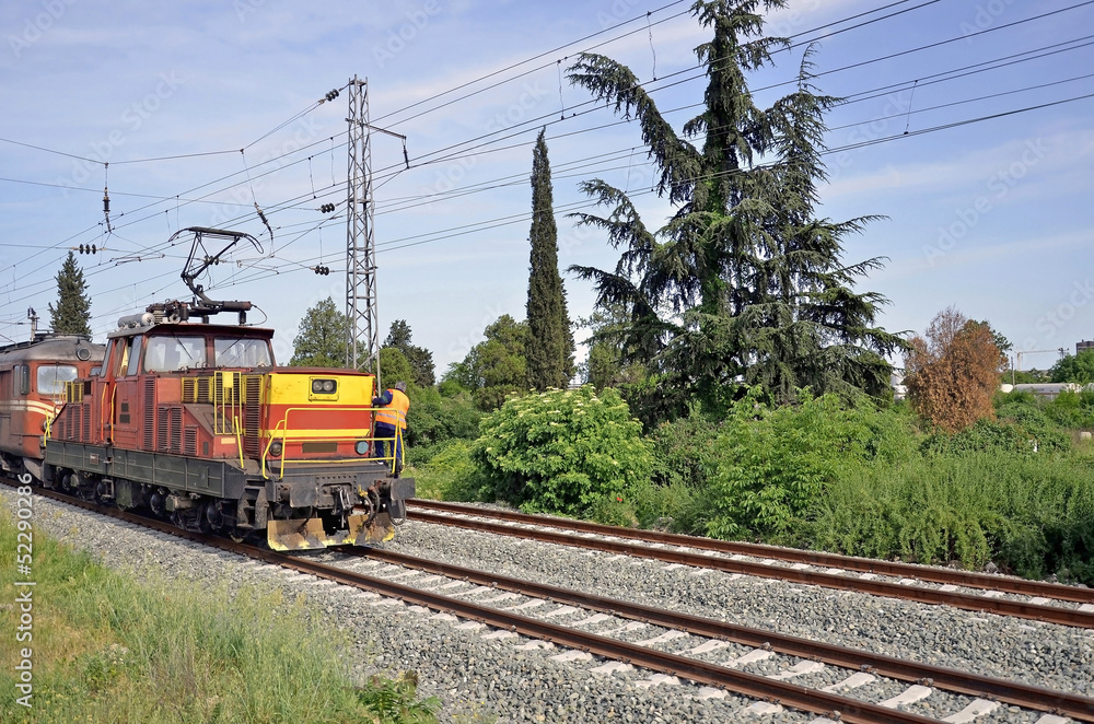 Fototapeta premium Old locomotive shunting at the station, Bulgaria.