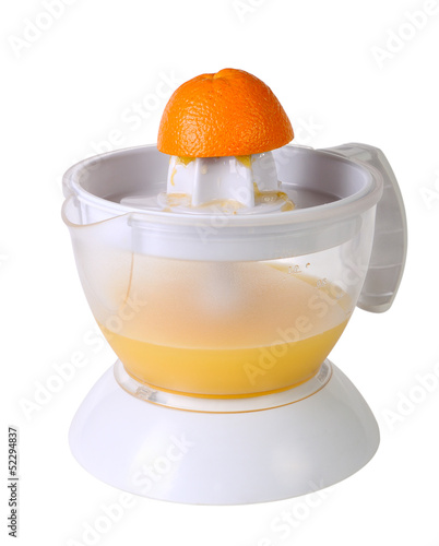 Juicer with juice and an orange half