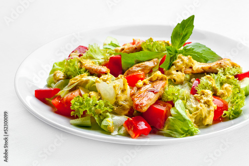 A Tasty food . The salad with roasted chicken . High quality ima