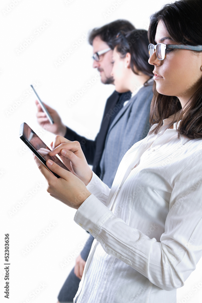 Businesswoman at work using a digital tablet Businesswoman at work using a digital tablet
