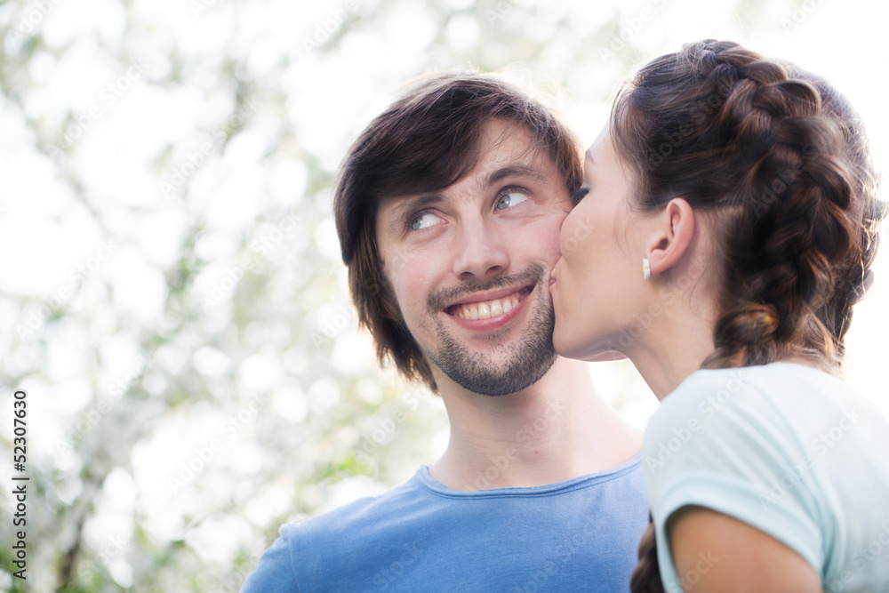 Young attractive couple together outdoors