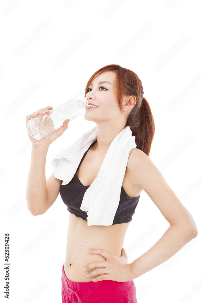 sporty young woman drinking water after workout sporty young woman drinking water after workout