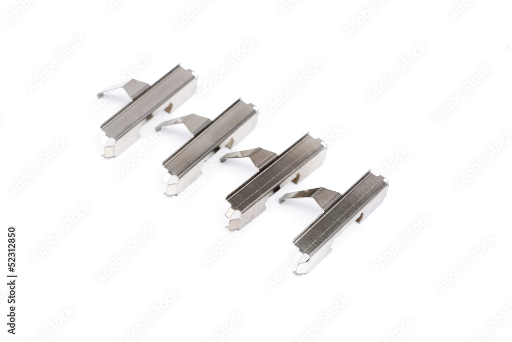 Spring from brake pads , isolatet on white Spring from brake pads , isolatet on white