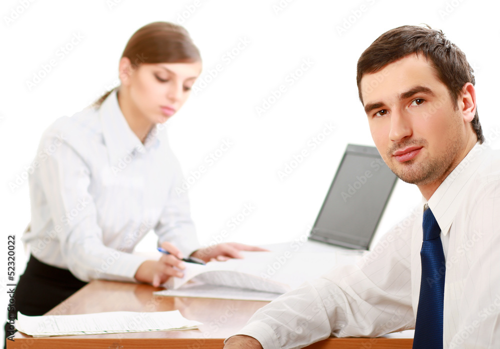 Colleagues working together in office. Colleagues working together in office.