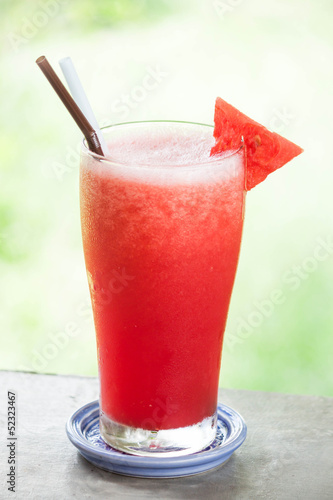 Wallpaper Mural Red water melon fruit juice frappe with green bokeh background Torontodigital.ca