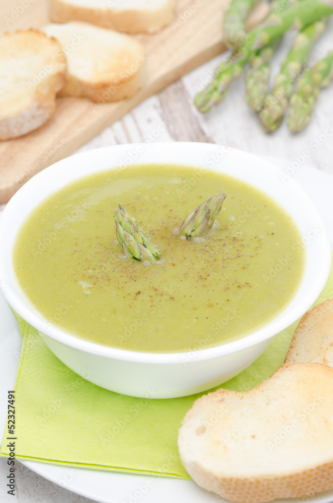 cream soup of asparagus and green peas vertical cream soup of asparagus and green peas vertical