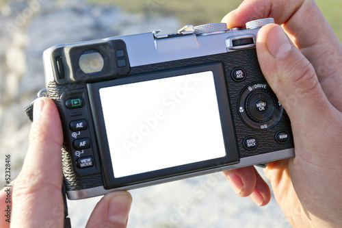 Photocamera in a hands