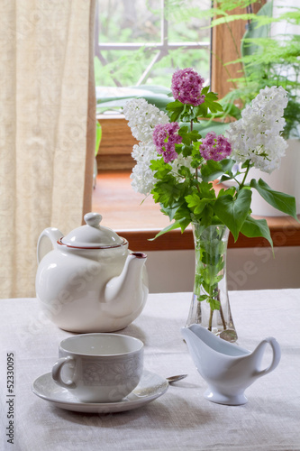 Teacup, teapot and milk jug