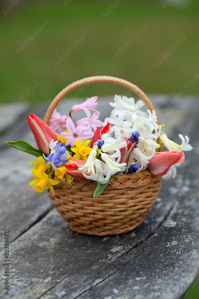 spring flowers on wooden table spring flowers on wooden table