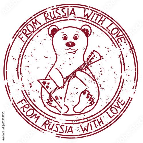 Stamp with bear playing on Russian balalaika