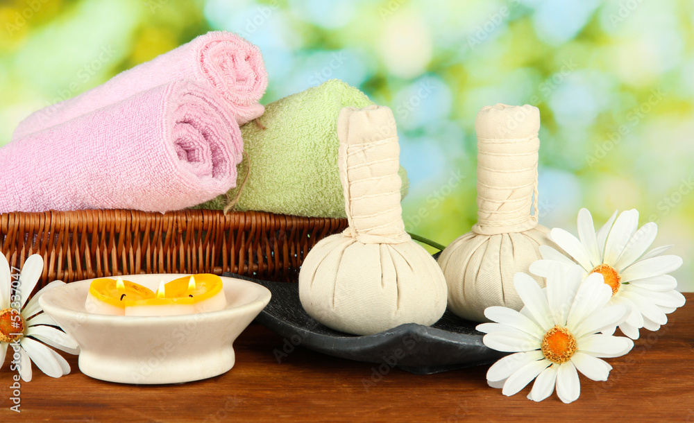 Textile massage spa equipment on nature background Textile massage spa equipment on nature background