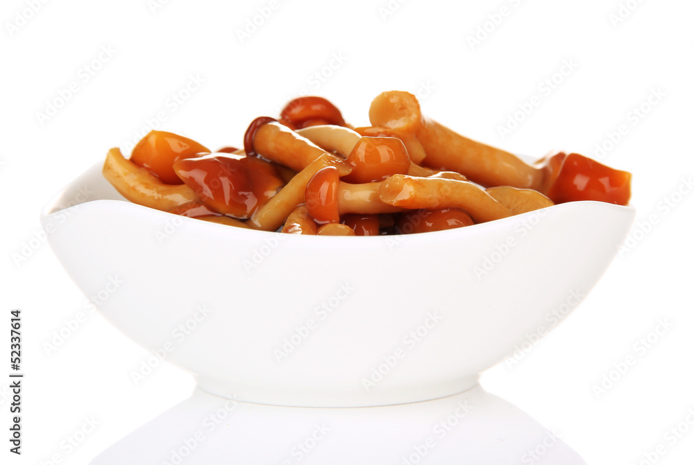 Mushrooms in bowl, isolated on white Mushrooms in bowl, isolated on white