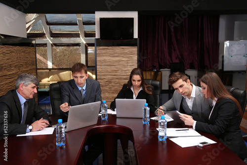 Business people working in ...