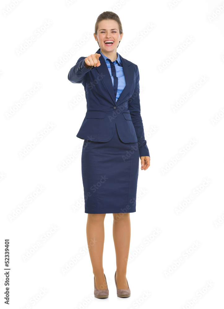 Full length portrait of business woman pointing in camera Full length portrait of business woman pointing in camera