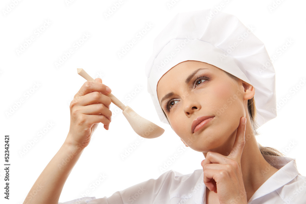 Woman cook eating with spoon, isolated on white background Woman cook eating with spoon, isolated on white background