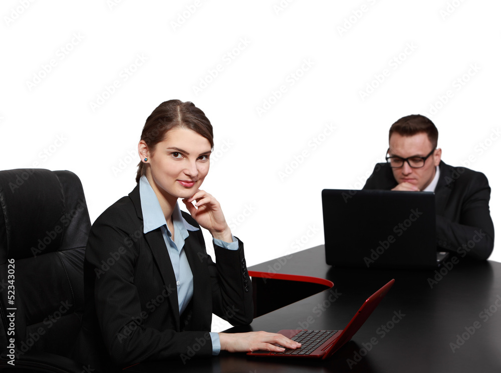 Young Business Couple on Laptops Young Business Couple on Laptops