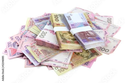 Pile of Ukrainian money, isolated on white