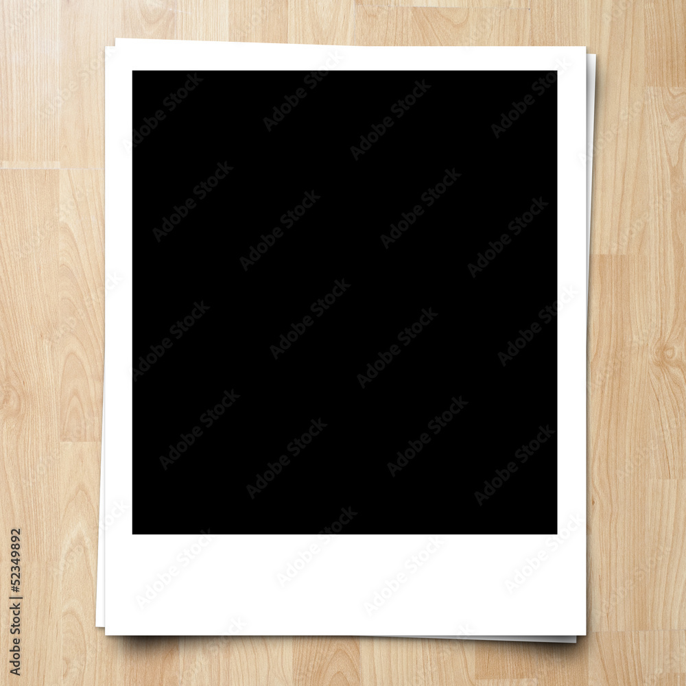 blank photo frame on brown wood plank background blank photo frame on brown wood plank background