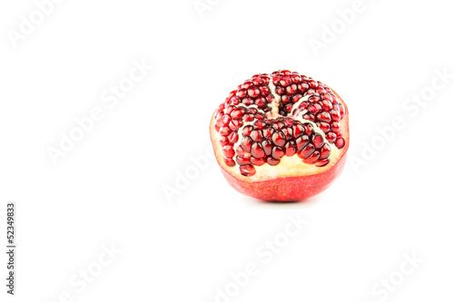 Pomegranate fruit with red seed with white background