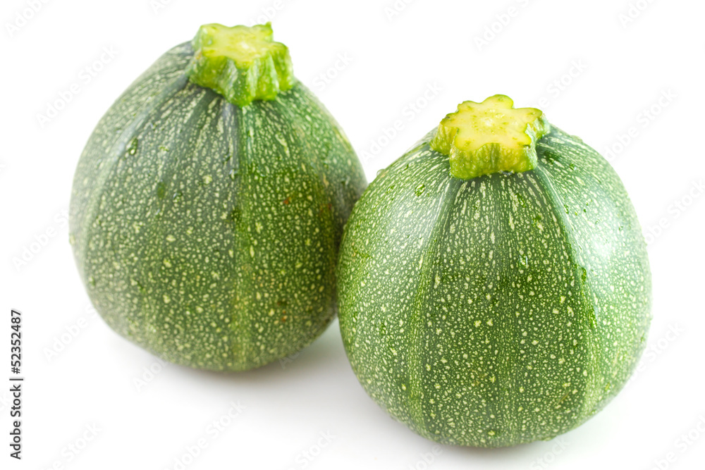 two zucchini on white background two zucchini on white background