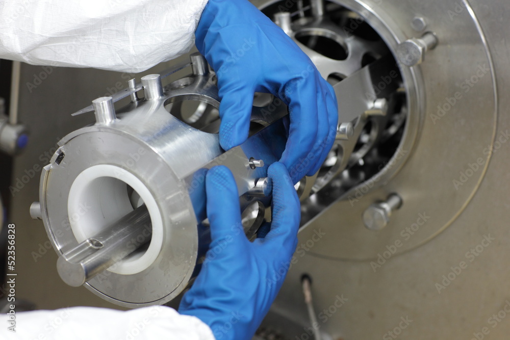 hands in gloves dealing with mech problem - details