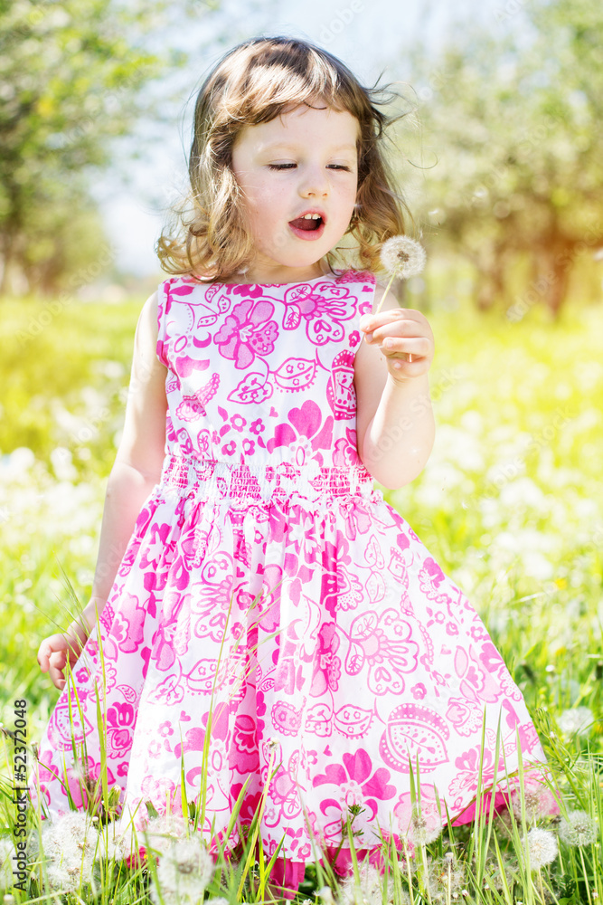 child girl at dandelion meadow in summer child girl at dandelion meadow in summer