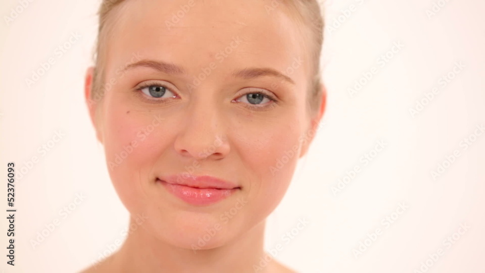Woman posing for a camera without make-up