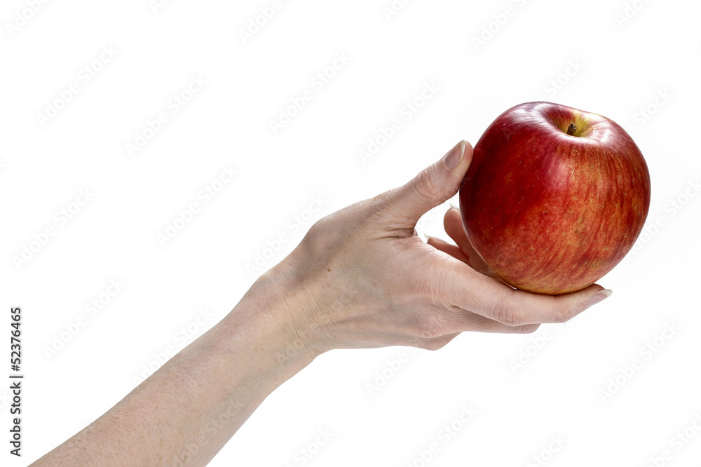 Fresh red apple in beautiful hand isolated on white background. Fresh red apple in beautiful hand isolated on white background.