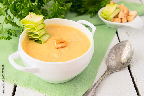 Cream soup from  marrows in bowl photo