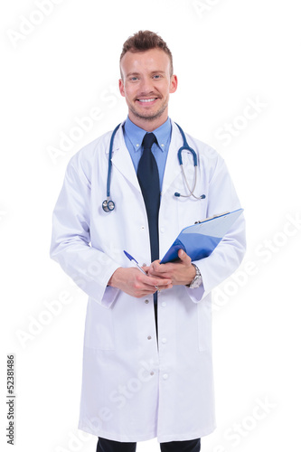 smiling doctor holding a pen and a clipboard