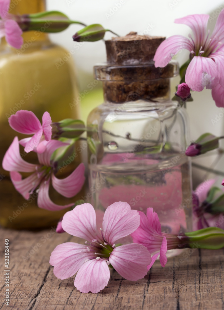 spa settings with pink flowers spa settings with pink flowers