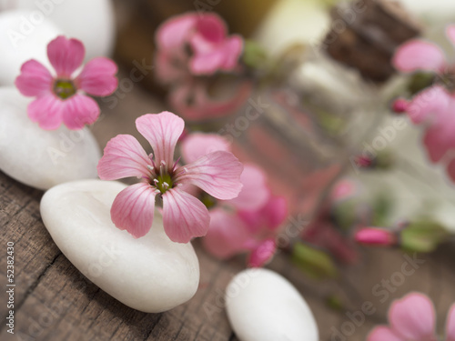 spa settings with pink flowers
