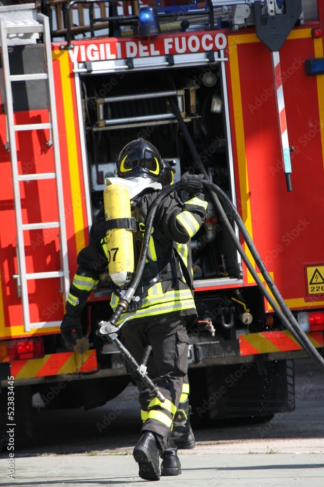 brave firefighters with oxygen tank fire during an exercise held