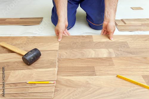 Installing wooden laminate flooring
