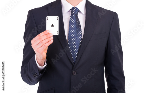 Businessman showing playing card.