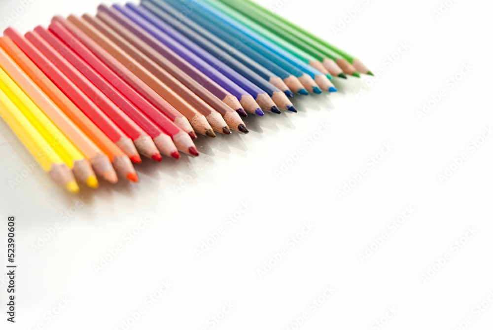 close up of color pencils on white close up of color pencils on white