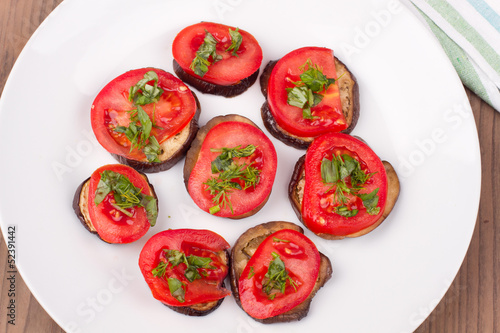 Grilled eggplants with tomatoes