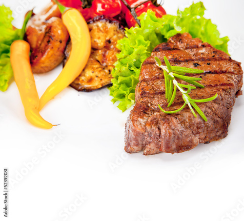 Grilled steak and potato isolated on white background