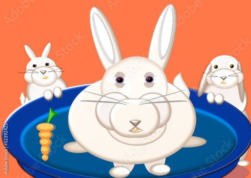 Coneja en cuna con zanahoria y dos conejos bebés.