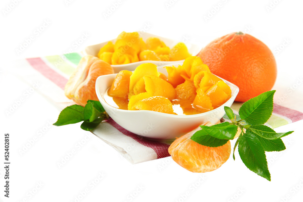 Orange jam with zest and tangerines, isolated on white Orange jam with zest and tangerines, isolated on white