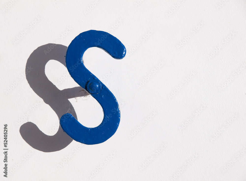 metal object shaped S metal object shaped S