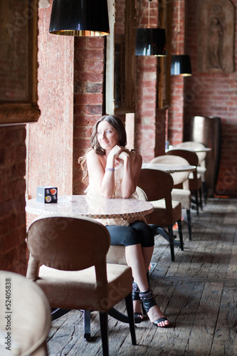 Girl in the bar waiting for somebody