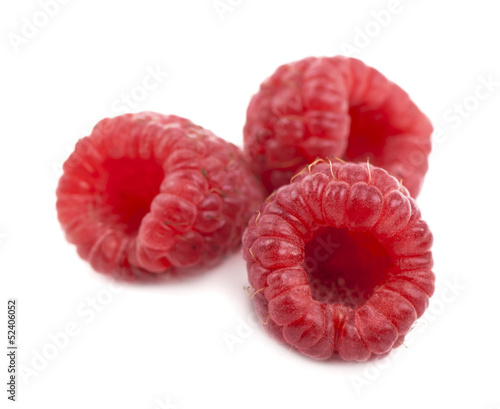 Ripe raspberries isolated on white background
