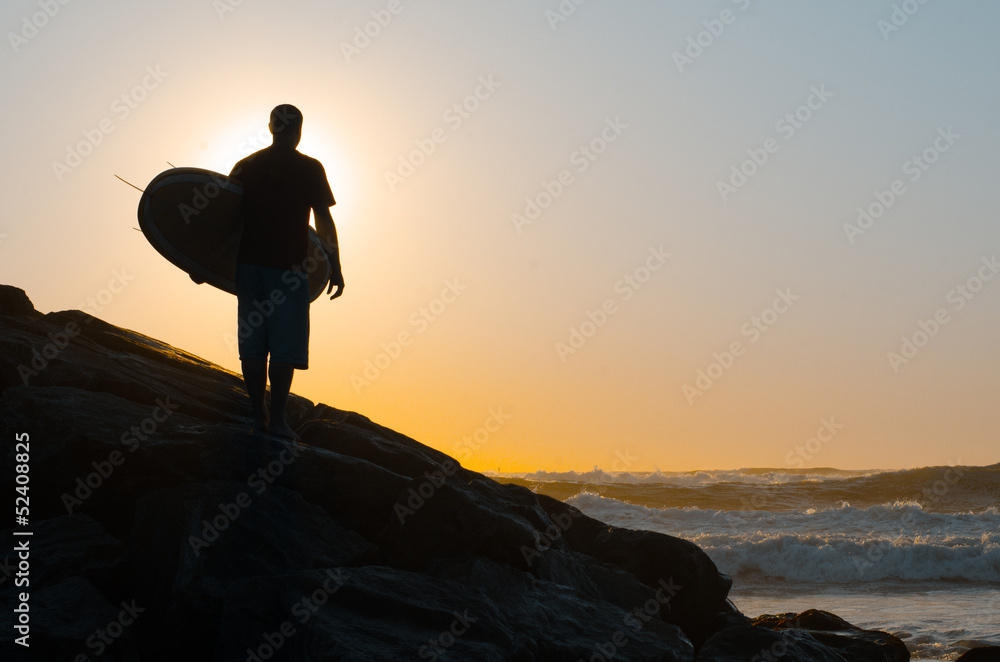 Surfer watching the waves